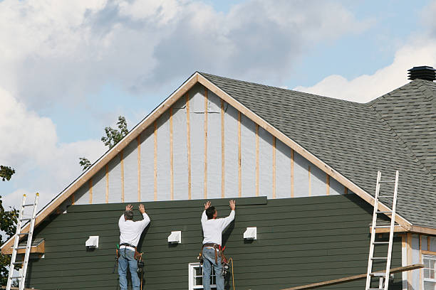 Professional Siding technician working in Houston, PA